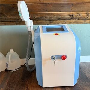 White and Blue Laser Machine